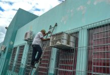 Setor de pinturas atuando na preservação da estrutura na Escola Carlos Chagas
